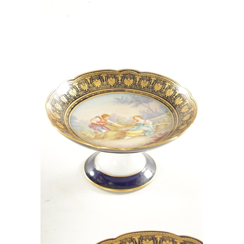 53 - A FINE LATE 19TH CENTURY FRENCH SEVRES PORCELAIN DESSERT SERVICE painted with romantic figural scene... 