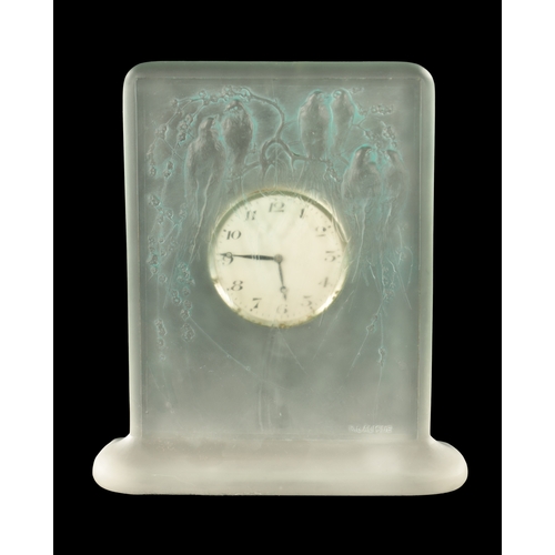 9 - AN UNUSUAL R LALIQUE 'SIX HIRONDELLES PERCHEES' GREEN STAINED CLOCK of footed rectangular form highl... 