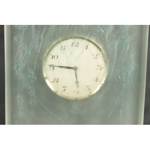 9 - AN UNUSUAL R LALIQUE 'SIX HIRONDELLES PERCHEES' GREEN STAINED CLOCK of footed rectangular form highl... 