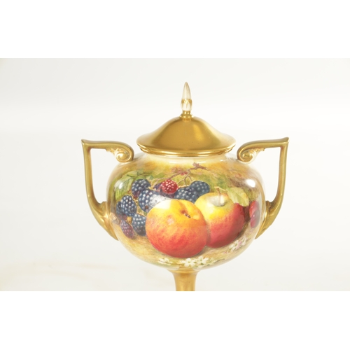 90 - A ROYAL WORCESTER TWIN HANDLED PORCELAIN VASE AND COVER painted by William Ricketts with apples, bla... 