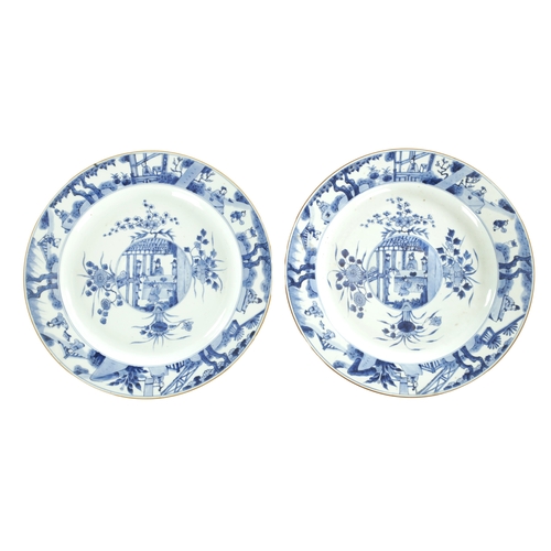 95 - A PAIR OF LARGE CHINESE QING DYNASTY BLUE AND WHITE PORCELAIN CHARGERS with cushion centres, shallow... 