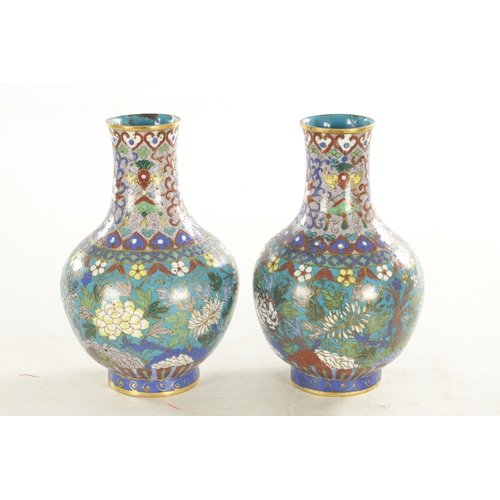 202 - A PAIR OF 19TH CENTURY CHINESE CLOISONNE VASES the bulbous bodies decorated continuous bands of bloo... 