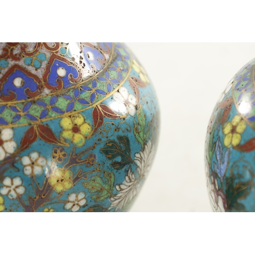 202 - A PAIR OF 19TH CENTURY CHINESE CLOISONNE VASES the bulbous bodies decorated continuous bands of bloo... 