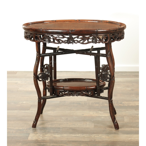 205 - A 19TH CENTURY CHINESE HARDWOOD OVAL SHAPED TWO-TIER TABLE with faux bamboo mouldings and supports d... 