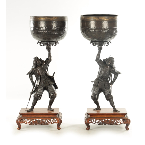 211 - A PAIR OF JAPANESE MEIJI PERIOD BRONZE SAMURAI WARRIOR GONGS depicting two Samurai holding open soun... 