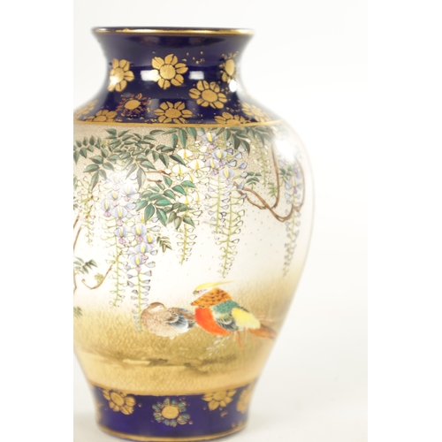 216 - A JAPANESE MEIJI PERIOD SATSUMA VASE the ovoid body decorated with two panels, one side depicting a ... 