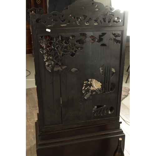 221 - A GOOD 19TH CENTURY CARVED CHINESE HARDWOOD DISPLAY CABINET finely decorated with pierced branchwork... 