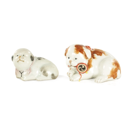 227 - TWO JAPANESE MEIJI PERIOD PORCELAIN FIGURES OF RECUMBENT DOGS one with incised marks for Makuzu Koza... 