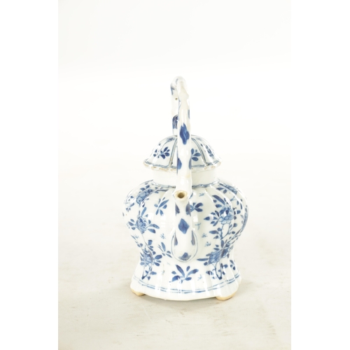 231 - AN EARLY CHINESE BLUE AND WHITE TEAPOT BEARING KANGXI MARK BENEATH the shaped and fluted body with t... 