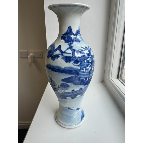 232 - A 19TH CENTURY CHINESE PORCELAIN BLUE AND WHITE BALUSTER VASE with pagodas in landscape setting - fo... 