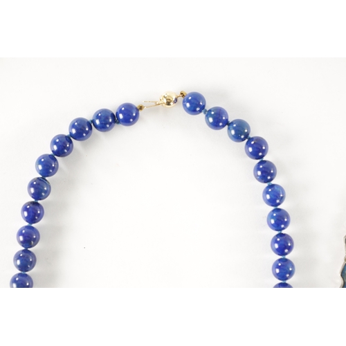 239 - A 14CT GOLD LAPIS LAZULI BEADED NECKLACE AND A SPANISH SILVER AND LAPIS LAZULI NECKLACE, the beaded ... 