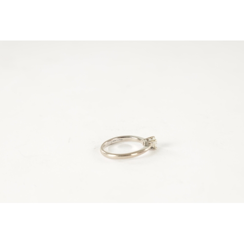 247 - AN 18CT WHITE GOLD DIAMOND SOLITAIRE RING, with square cut diamond in a four claw setting. Total wei... 