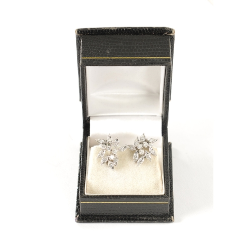 248 - A PAIR OF 18CT WHITE GOLD AND DIAMOND EARRINGS, of flower spray design each set with twelve brillian... 