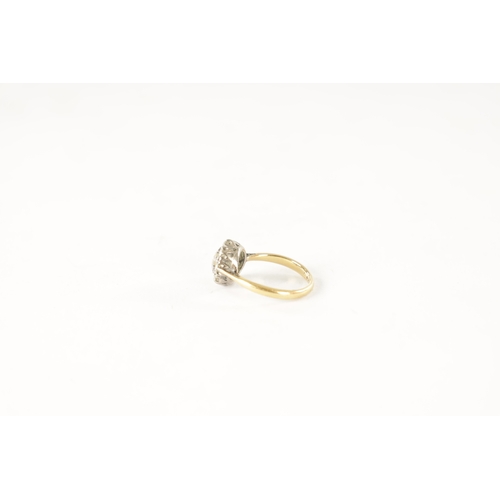 252 - AN 18CT GOLD AND DIAMOND DAISY RING, with an app. 0.5ct centre stone surrounded by eight smaller sto... 