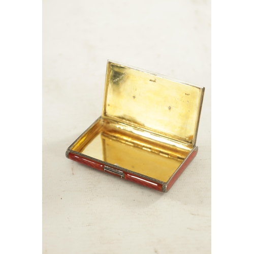 258 - AN ART DECO SILVER AND RED GUILLOCHE ENAMEL CIGARETTE CASE, with engraved border and mounted garland... 