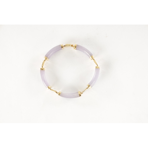 264 - A CHINESE 14CT GOLD LAVENDER JADE BRACELET, each link with pierced Chinese script. Total weight app.... 