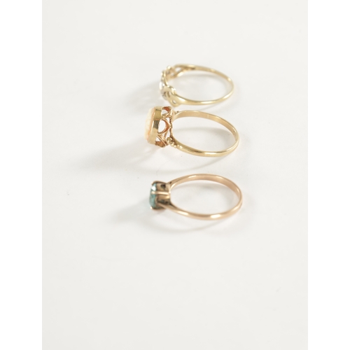 290 - A COLLECTION OF THREE 9CT GOLD RINGS, comprising of a cameo ring, a diamond set platted ring and an ... 