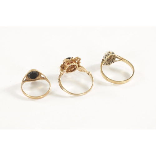 294 - A COLLECTION OF THREE 9CT GOLD RINGS, comprising of a gold ring with pierced end scrollwork setting ... 