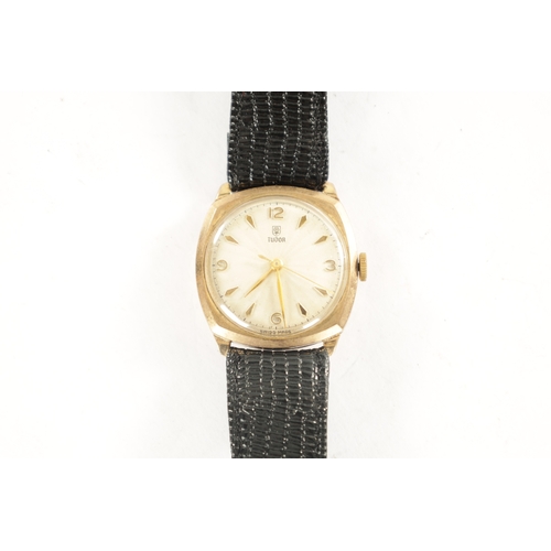 297 - A GENTLEMAN’S 1950’S 9CT GOLD CUSHION CASED ROLEX TUDOR WRISTWATCH, on black strap, the champagne en... 