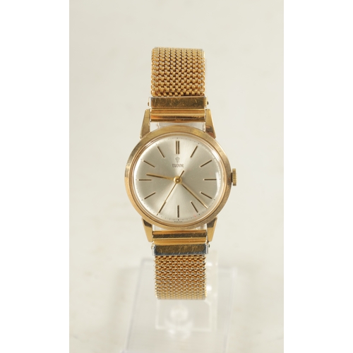 354 - A GENTLEMAN’S VINTAGE 9CT GOLD ROLEX TUDOR WRISTWATCH on the gold plated bracelet, the silvered dial... 