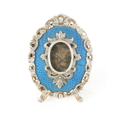 373 - A 19TH CENTURY RUSSIAN SILVER AND BLUE GUILLOCHE ENAMEL MINIATURE PHOTO FRAME (7cm high)