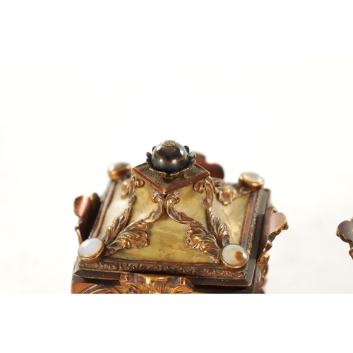 666 - A PAIR OF LATE 19TH CENTURY FRENCH GILT METAL AND MOTHER-OF-PEARL PANELLED CASKETS set with tiger's ... 