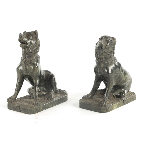 668 - A PAIR OF 19TH CENTURY SERPENTINE MARBLE SCULPTURES, modelled as seated dogs on rectangular bases. (... 