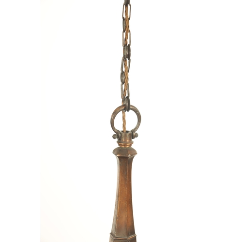 670 - AN EARLY 20TH CENTURY COPPER THREE BRANCH CHANDELIER WITH VASALINE SHADES with shaped turned column ... 