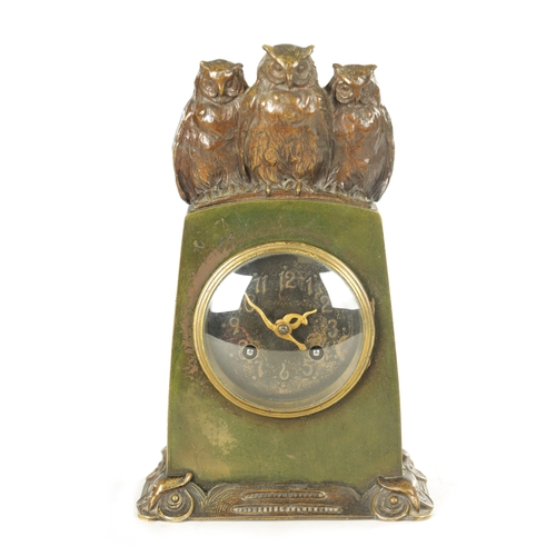 1001 - TIFFANY & CO. A STYLISH ARTS AND CRAFTS GREEN AND BROWN BRONZE PATINATED TRIPLE OWL MANTEL CLOCK the... 