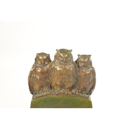 1001 - TIFFANY & CO. A STYLISH ARTS AND CRAFTS GREEN AND BROWN BRONZE PATINATED TRIPLE OWL MANTEL CLOCK the... 