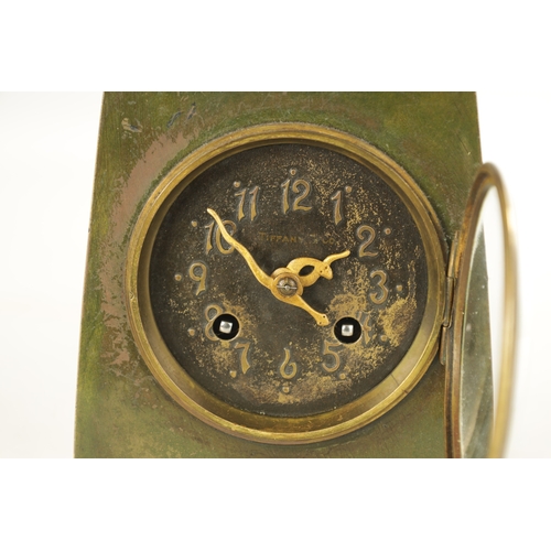 1001 - TIFFANY & CO. A STYLISH ARTS AND CRAFTS GREEN AND BROWN BRONZE PATINATED TRIPLE OWL MANTEL CLOCK the... 