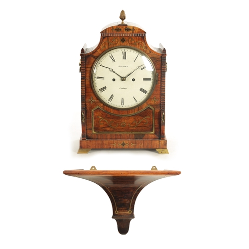 1002 - JNO. HILL. LONDON A LATE REGENCY BRASS INLAID EIGHT DAY ROSEWOOD BRACKET CLOCK The shallow arched sh... 