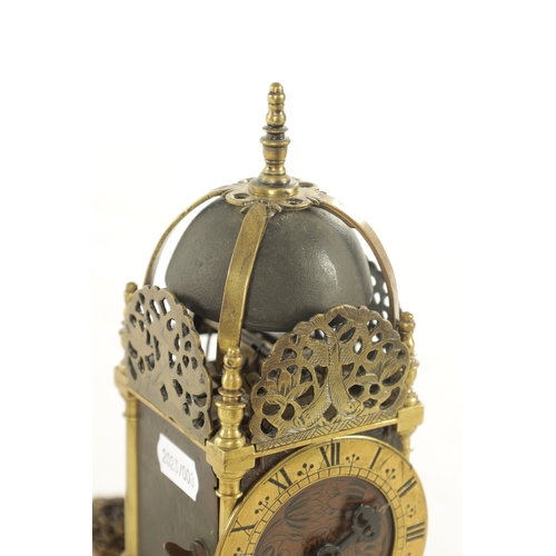 1011 - A RARE LATE 17TH CENTURY MINIATURE ENGLISH LANTERN CLOCK surmounted by a bell supported on brass str... 