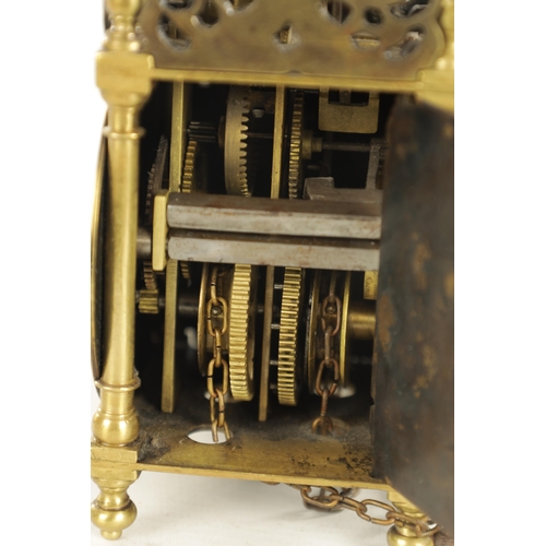 1011 - A RARE LATE 17TH CENTURY MINIATURE ENGLISH LANTERN CLOCK surmounted by a bell supported on brass str... 