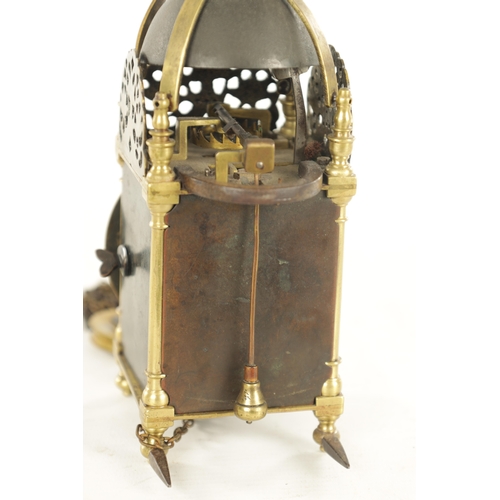 1011 - A RARE LATE 17TH CENTURY MINIATURE ENGLISH LANTERN CLOCK surmounted by a bell supported on brass str... 