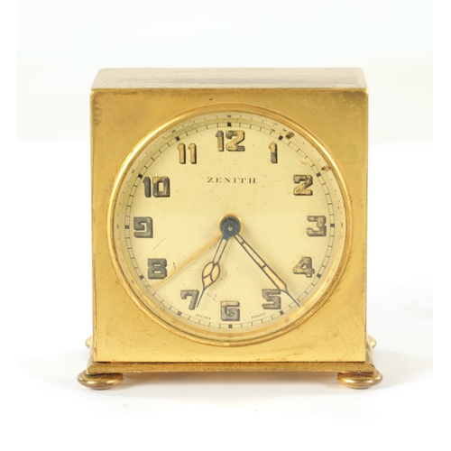 1017 - A 1930'S ZENITH WATCH CO. SWISS BOUDOIR TRAVELLING ALARM CLOCK the plain square gilt brass case on b... 