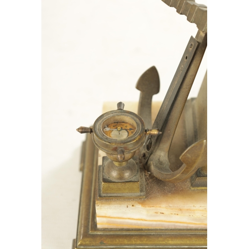 997 - A LATE 19TH CENTURY FRENCH INDUSTRIAL BRASS DESK COMPENDIUM MANTEL CLOCK with surmount revolving 4