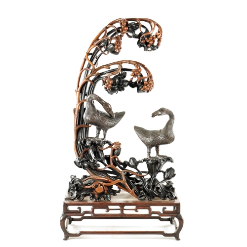 135 - AN IMPRESSIVE 19TH CENTURY CHINESE CARVED HARDWOOD AND BRONZE MOUNTED SCULPTURE with overhanging flo... 