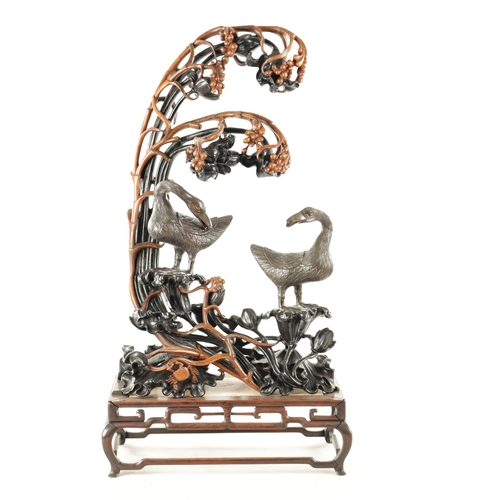 135 - AN IMPRESSIVE 19TH CENTURY CHINESE CARVED HARDWOOD AND BRONZE MOUNTED SCULPTURE with overhanging flo... 