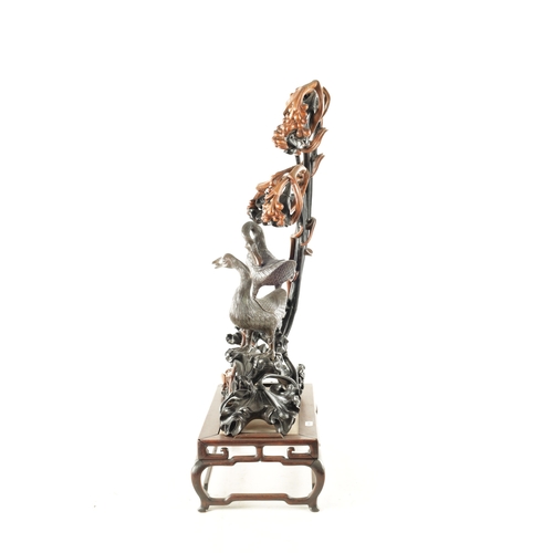 135 - AN IMPRESSIVE 19TH CENTURY CHINESE CARVED HARDWOOD AND BRONZE MOUNTED SCULPTURE with overhanging flo... 