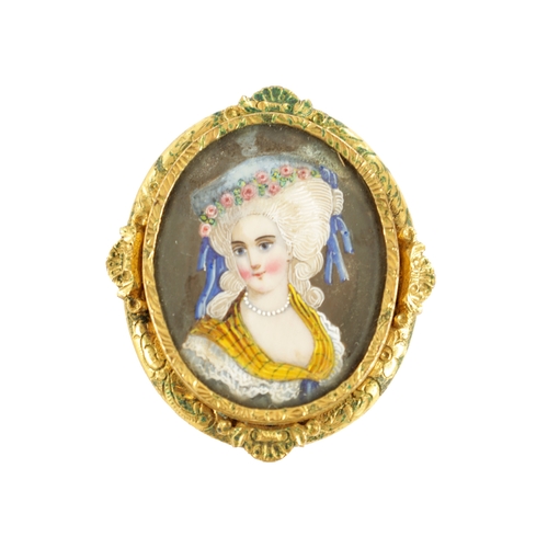 271 - A 19TH CENTURY MINIATURE PORTRAIT BROOCH depicting the head and shoulders of a young lady - in a gol... 