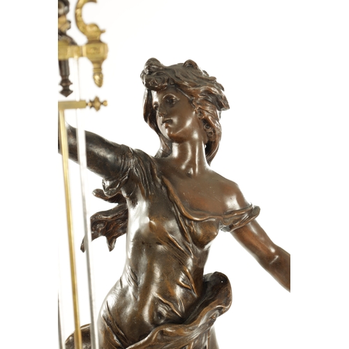 1005 - A LARGE LATE 19TH CENTURY FRENCH FIGURAL MYSTERY CLOCK the patinated metal sculpture modelled as a y... 