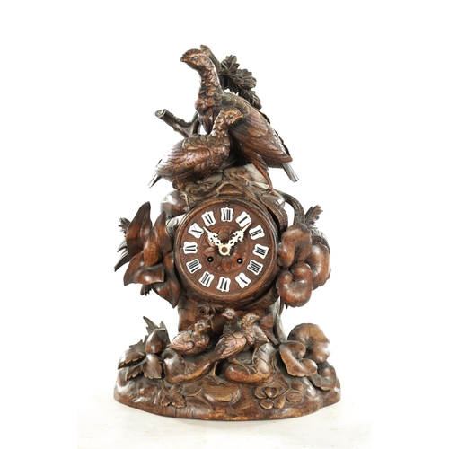 1010 - A 19TH CENTURY BLACK FOREST CARVED LINDEN WOOD MANTEL CLOCK with a family of grouse amongst foliage ... 