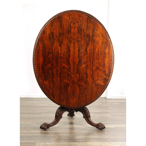 1391 - GILLOWS LANCASTER. A MID 19TH CENTURY FIGURED ROSEWOOD OVAL TILT TOP BREAKFAST TABLE the top with bo... 