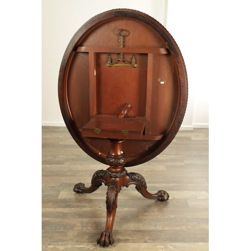 1391 - GILLOWS LANCASTER. A MID 19TH CENTURY FIGURED ROSEWOOD OVAL TILT TOP BREAKFAST TABLE the top with bo... 