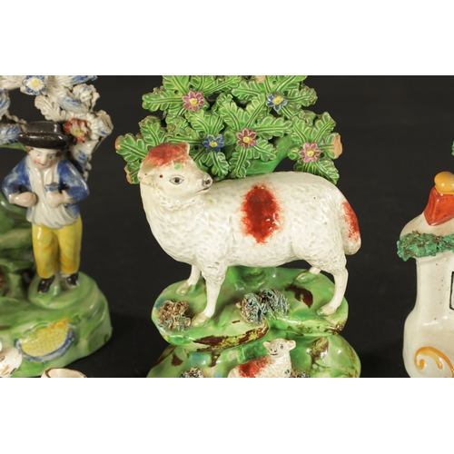 101 - A GROUP OF ELEVEN 19TH CENTURY STAFFORDSHIRE FIGURES including a pair of deer and sheep examples (16... 