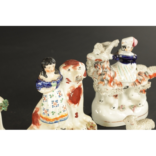 101 - A GROUP OF ELEVEN 19TH CENTURY STAFFORDSHIRE FIGURES including a pair of deer and sheep examples (16... 