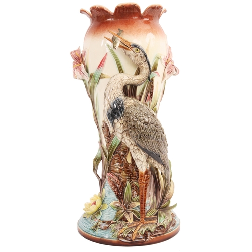 102 - A LARGE 19TH CENTURY MAJOLICA STICK STAND with a heron fishing on a floral ground (56cm high)