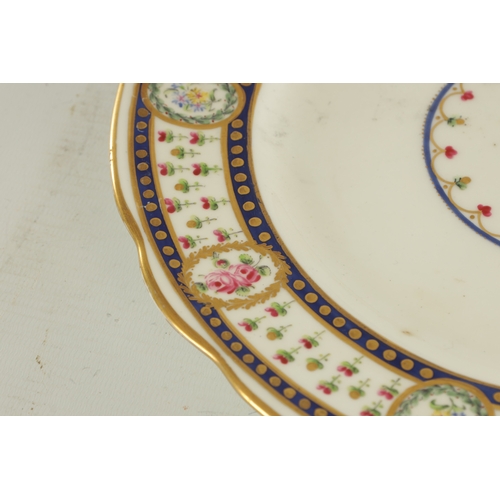 104 - TWO 19TH CENTURY WEDGWOOD HAND-PAINTED CABINET PLATES with bands of flowers highlighted in gilt (26c... 