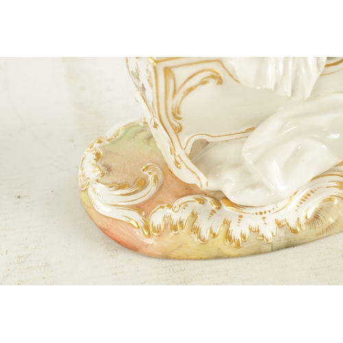 106 - A 19TH CENTURY MEISSEN CRADLE AND CHERUB FIGURE of elaborate design highlighted in gilt and set on a... 